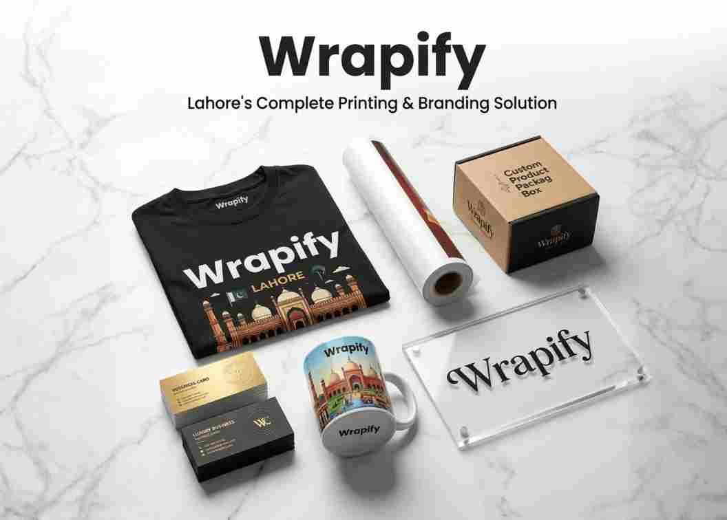 Custom printed shirt, mug, and business cards by Wrapify displayed on a marble floor for branding and promotional printing services